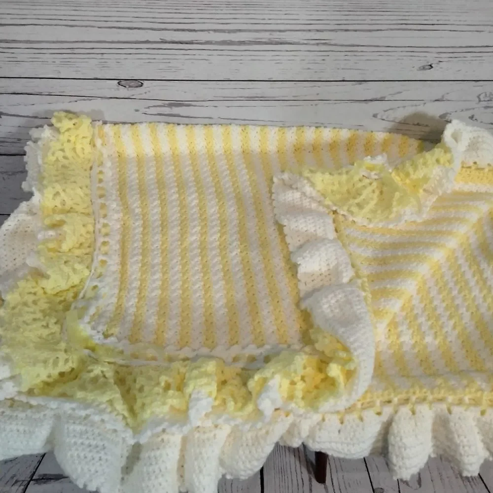 Never been used.  ( my mom) homemade baby blanket.